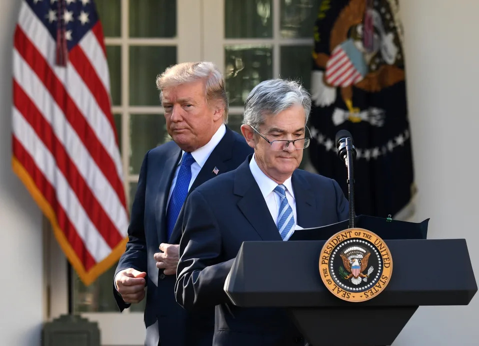 The shadow of Trump looms over a cautious Fed